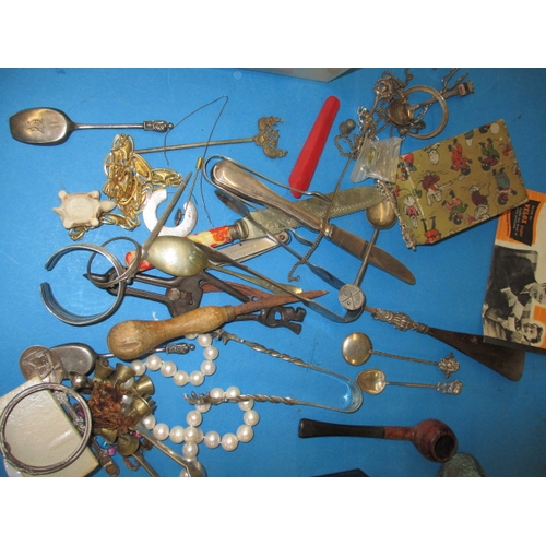 105 - A parcel of interesting collectables, to include some white metal items and a tin plate clockwork mo... 