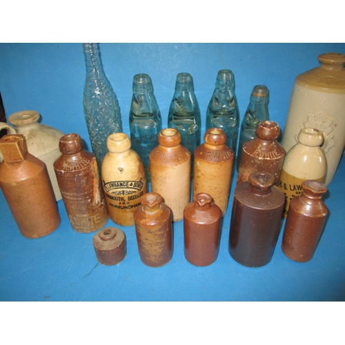 112 - A quantity of vintage bottles and stoneware pots, all in used condition