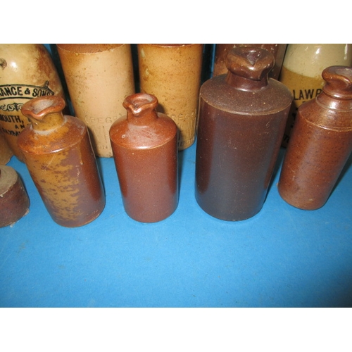 112 - A quantity of vintage bottles and stoneware pots, all in used condition