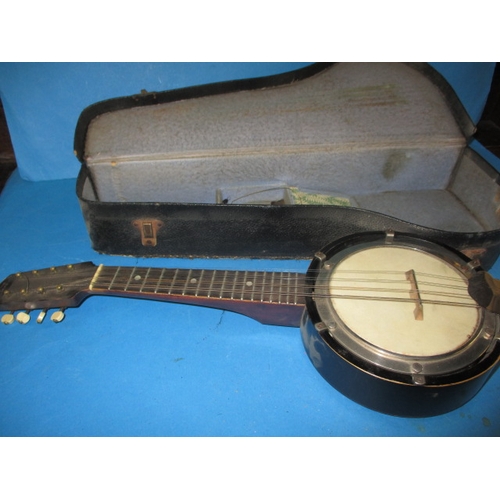 114 - A vintage 8 string banjo-mandolin in fitted hard case, in useable pre-owned condition, approx. lengt... 