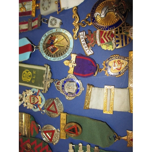 118 - A collection of medals and awards, Masonic and driving related, some silver examples, all in used co... 