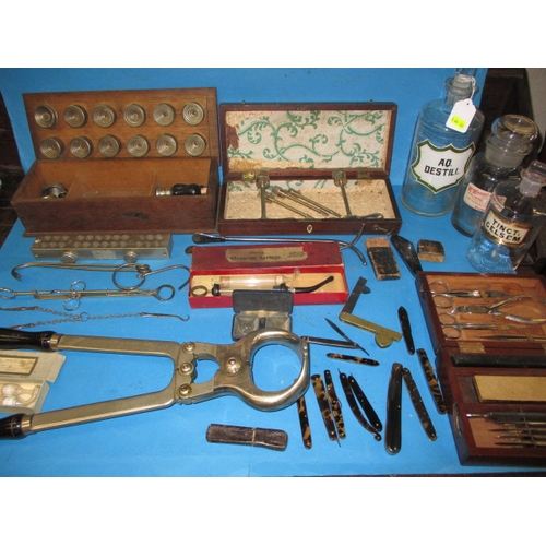 130 - A parcel of antique and later medical equipment, to include WWI British Military surgeons tools and ... 