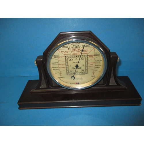 131 - A 1930s Art Deco Bakelite cased storm guide barometer, marked for John Trotter Ltd Glasgow, in used ... 