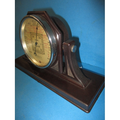 131 - A 1930s Art Deco Bakelite cased storm guide barometer, marked for John Trotter Ltd Glasgow, in used ... 