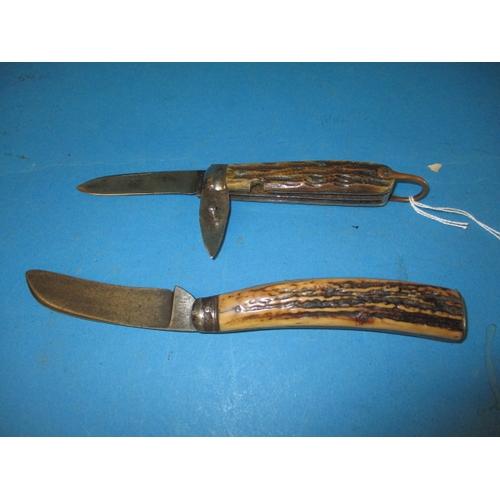 134 - Two antique folding blade pocket knives, both with antler mounts, in used condition, approx. length ... 