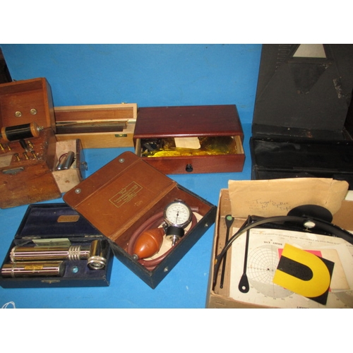 136 - A parcel of vintage medical and other instruments, to include an electric shock machine, all in used... 