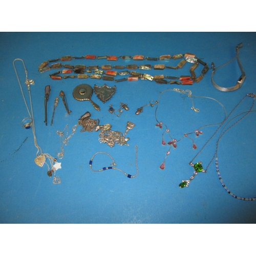 141 - A parcel of vintage costume jewellery, to include some silver items, all in used condition