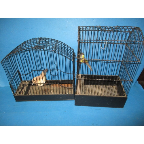 143 - A collection of vintage songbird cages, all in used condition