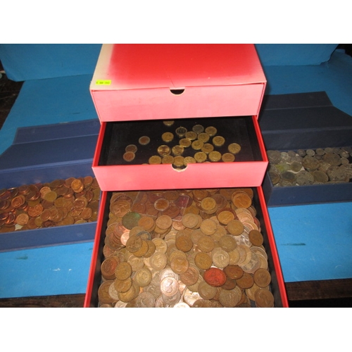 148 - A parcel of vintage coins, to include some silver and part-silver examples, housed in a 3 drawer car... 