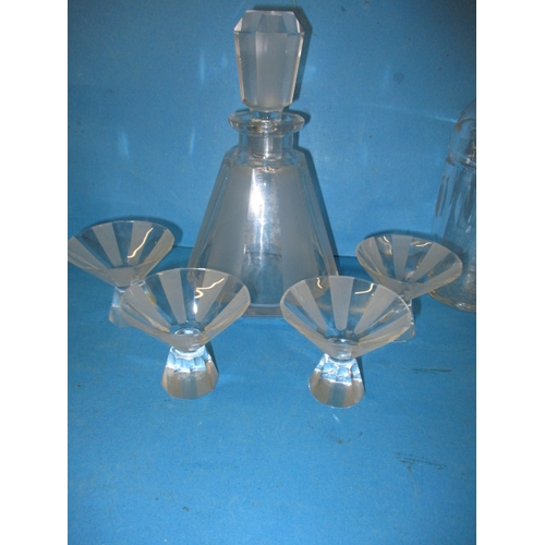 152 - Two vintage lead crystal decanters with matching glasses and another example, in pre-owned condition... 