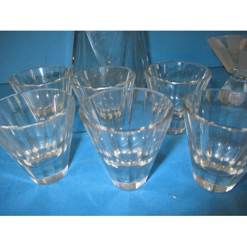 152 - Two vintage lead crystal decanters with matching glasses and another example, in pre-owned condition... 