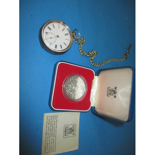 160 - A continental silver cased pocket watch, with white metal albert and a royal mint silver crown