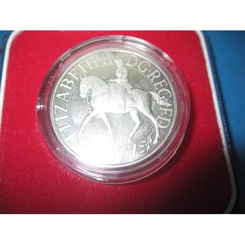 160 - A continental silver cased pocket watch, with white metal albert and a royal mint silver crown