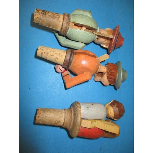 162 - Three vintage ANRI carved wood mechanical bottle stoppers, leaver operated, in good pre-owned condit... 