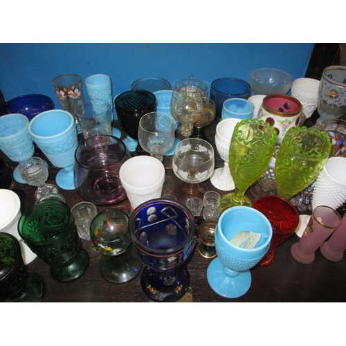 173 - A large quantity of antique and later glass drinking vessels, to include Sowerby and Uranium glass e... 