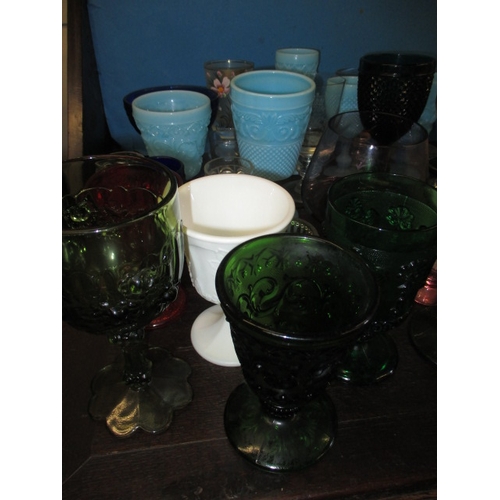 173 - A large quantity of antique and later glass drinking vessels, to include Sowerby and Uranium glass e... 