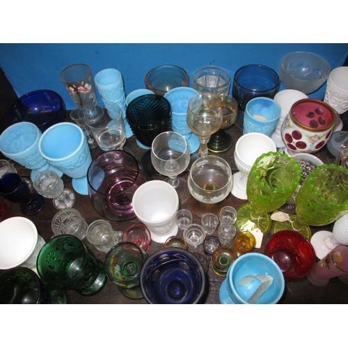 173 - A large quantity of antique and later glass drinking vessels, to include Sowerby and Uranium glass e... 