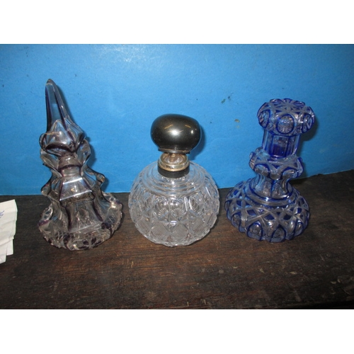 174 - 3 antique glass scent bottles, to include an Edwardian silver mounted example with original stopper.... 