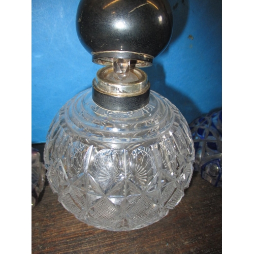 174 - 3 antique glass scent bottles, to include an Edwardian silver mounted example with original stopper.... 