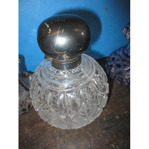 174 - 3 antique glass scent bottles, to include an Edwardian silver mounted example with original stopper.... 