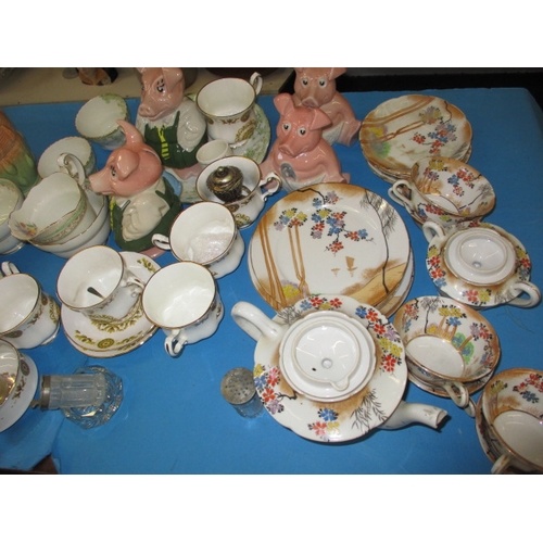 176 - A quantity of general clearance items to include Natwest pigs and part tea sets, items. All in pre-o... 