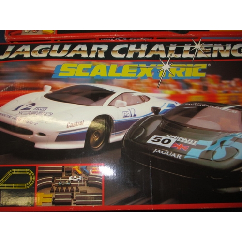 179 - 3 boxed sets of Scalextric motor racing games, and accessories, all in used condition