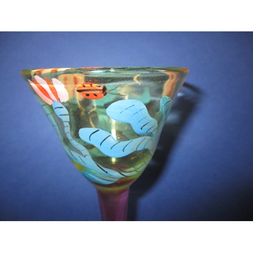 181 - A Boda artistic collection wine glass, retaining the original foil label and signed to base, approx.... 