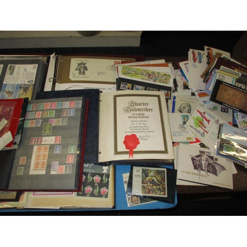 182 - A parcel of vintage stamps, to include albums and first day covers and the 22ct gold replica stamp c... 