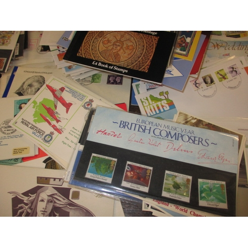 182 - A parcel of vintage stamps, to include albums and first day covers and the 22ct gold replica stamp c... 