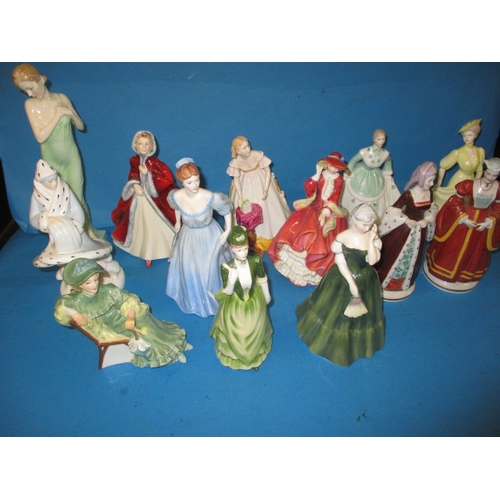 188 - A parcel of collectable figurines, to include examples by Doulton and Coalport, one with noted damag... 