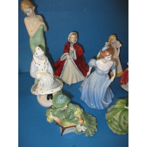 188 - A parcel of collectable figurines, to include examples by Doulton and Coalport, one with noted damag... 