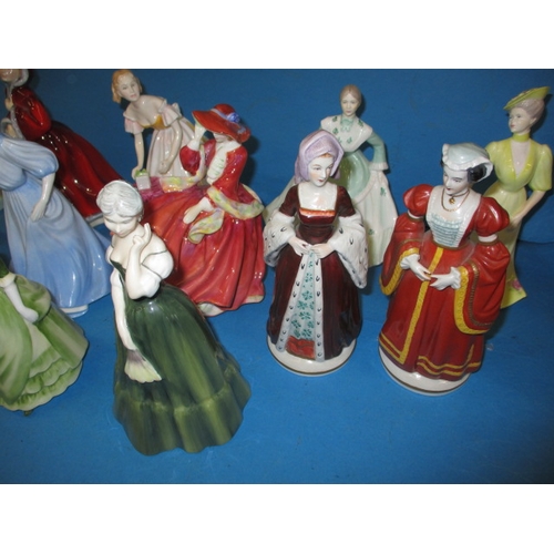 188 - A parcel of collectable figurines, to include examples by Doulton and Coalport, one with noted damag... 