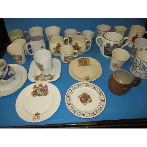 189 - A quantity of commemorative items, to include a mug designed by Richard Guyatt for Wedgwood, all in ... 