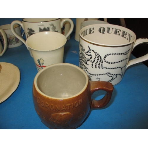 189 - A quantity of commemorative items, to include a mug designed by Richard Guyatt for Wedgwood, all in ... 