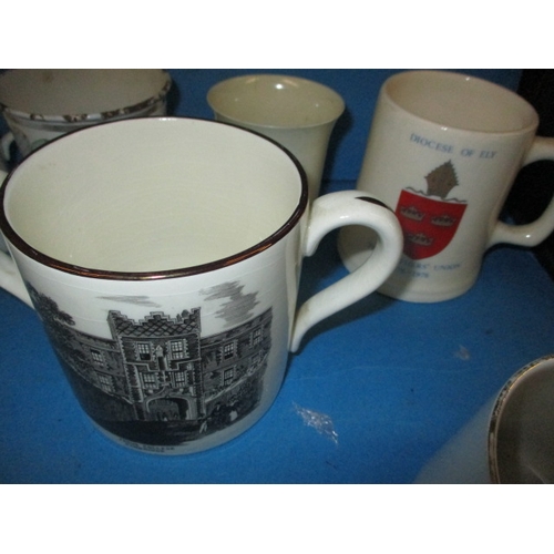 189 - A quantity of commemorative items, to include a mug designed by Richard Guyatt for Wedgwood, all in ... 