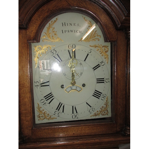 191 - An antique oak cased long case clock, painted dial marked ‘Hines. Ipswich’. Weights and pendulum, bu... 