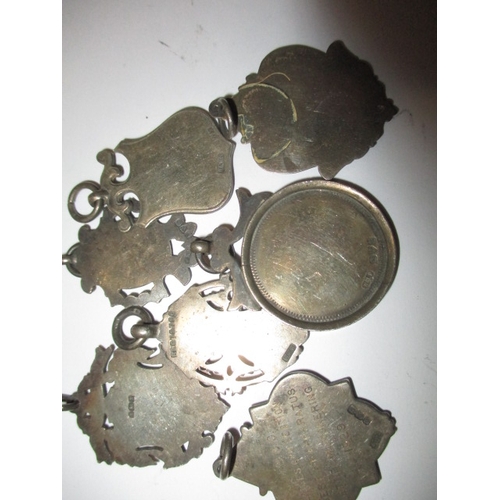 194 - A parcel of early 20th century medals and a silver trophy cup, Approx gross silver weight 118.5g, al... 