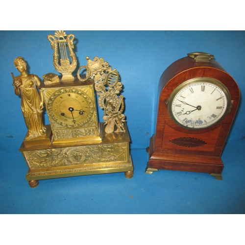 198 - A vintage Empire style brass clock and wood cased example with modified movement, neither tested as ... 