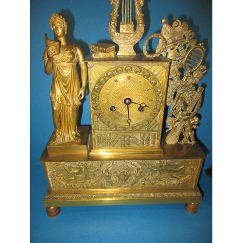 198 - A vintage Empire style brass clock and wood cased example with modified movement, neither tested as ... 