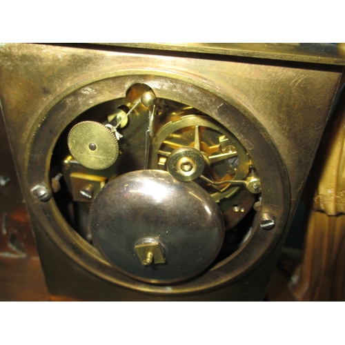 198 - A vintage Empire style brass clock and wood cased example with modified movement, neither tested as ... 