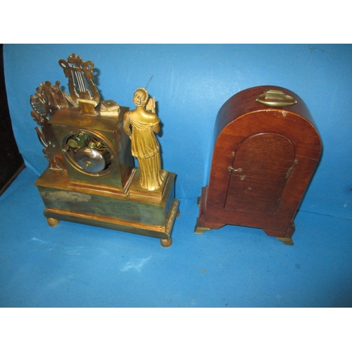 198 - A vintage Empire style brass clock and wood cased example with modified movement, neither tested as ... 