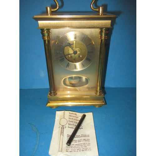 201 - A vintage brass carriage clock, by Anstey Wilson, striking on a bell, runs when wound, approx. heigh... 