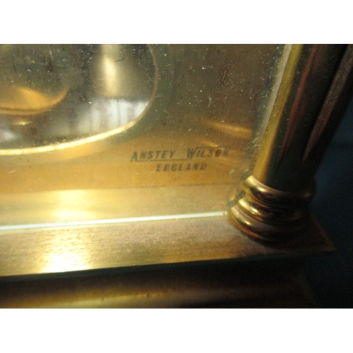 201 - A vintage brass carriage clock, by Anstey Wilson, striking on a bell, runs when wound, approx. heigh... 