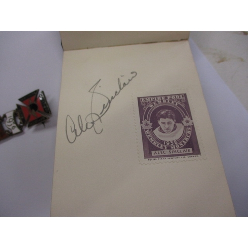 209 - A vintage autograph book with pictures and hand signed autographs of motorcycle speedway stars from ... 