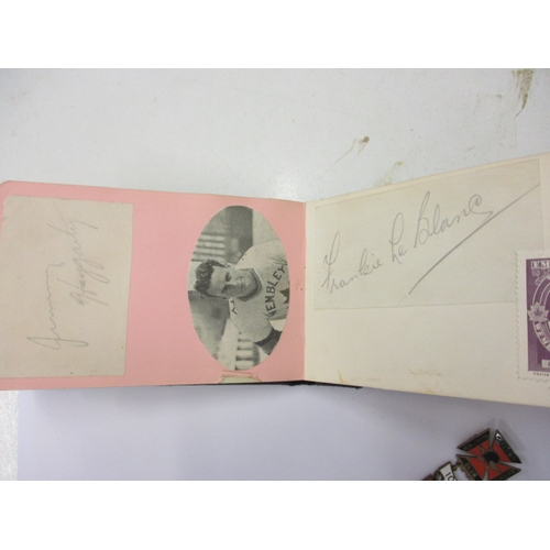 209 - A vintage autograph book with pictures and hand signed autographs of motorcycle speedway stars from ... 