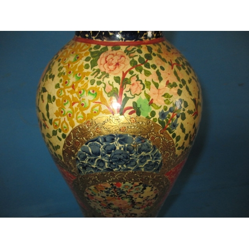 210 - A large papier mâché vase, with hand painted decoration, approx. height 43cm, in useable pre-owned c... 