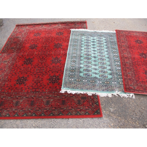 216 - Three vintage rugs to include an Afghan wool example