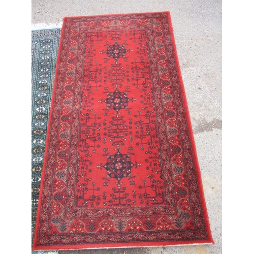 216 - Three vintage rugs to include an Afghan wool example