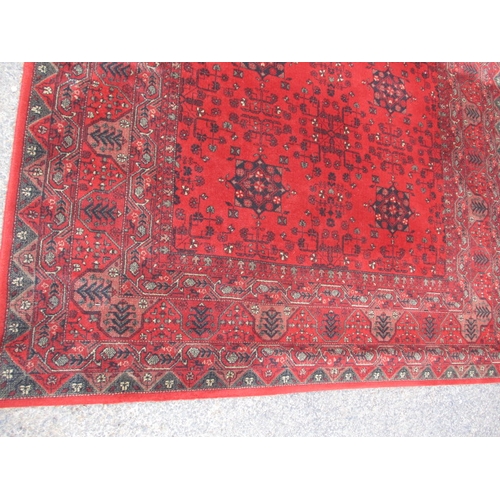 216 - Three vintage rugs to include an Afghan wool example