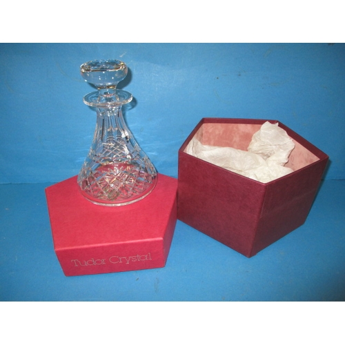 222 - A boxed Tudor crystal spirit decanter, in unused condition, approx. height 19cm